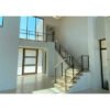 Entry-Glass-Stair-with-Steel-Posts-Keuka-Studios (1) Frameless Glass Railing